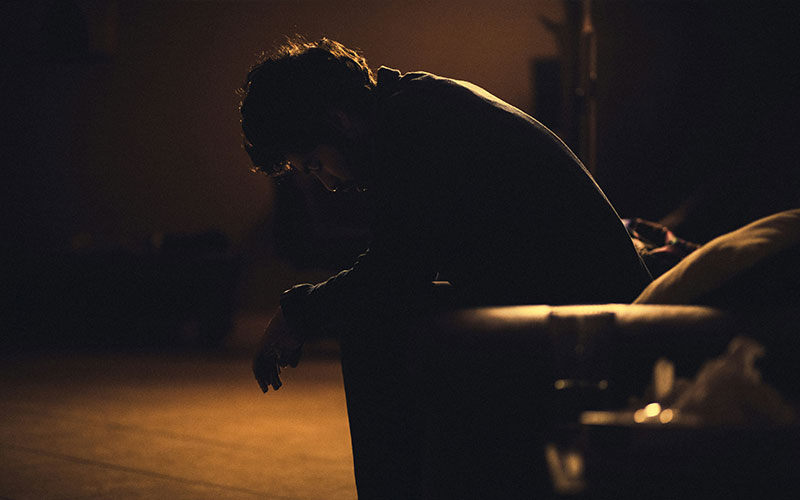 person experiencing depression at home