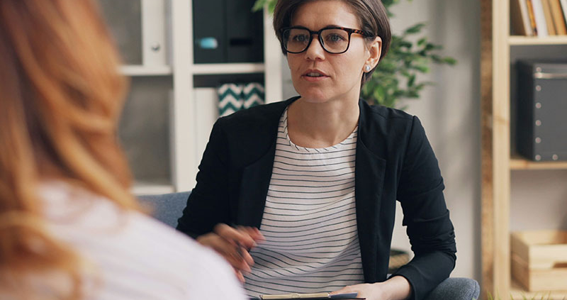 therapist telling patient about CBT therapy in New Haven, ct